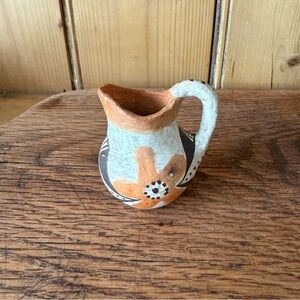 Vintage Acoma Pueblo clay pottery pitcher.